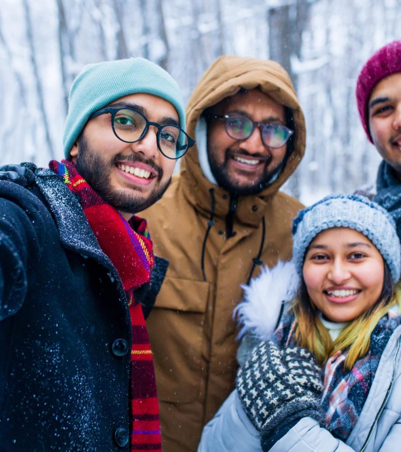 four-people-taking-selfie-shot-outdoors-at-new-yea-2023-11-27-05-03-36-utc-min